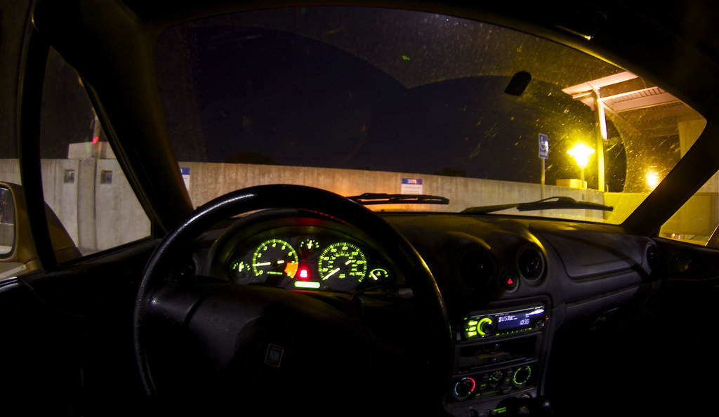 Car dashboard glowing at night